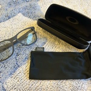 Never used prescription Oakley frame with case and bag.